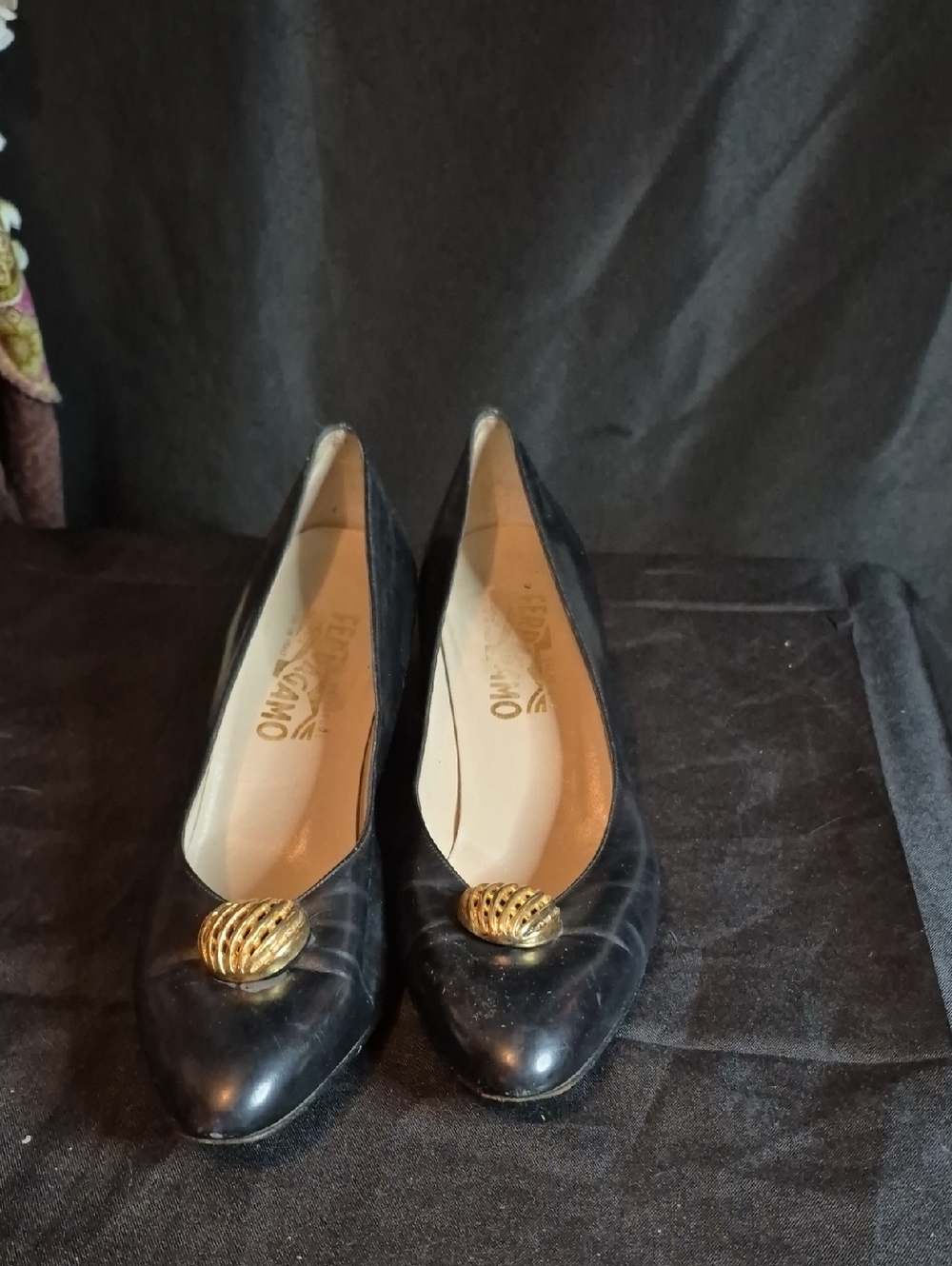 Salvatore Ferragamo Black Leather Pointed-Toe Flats with Gold Emblem